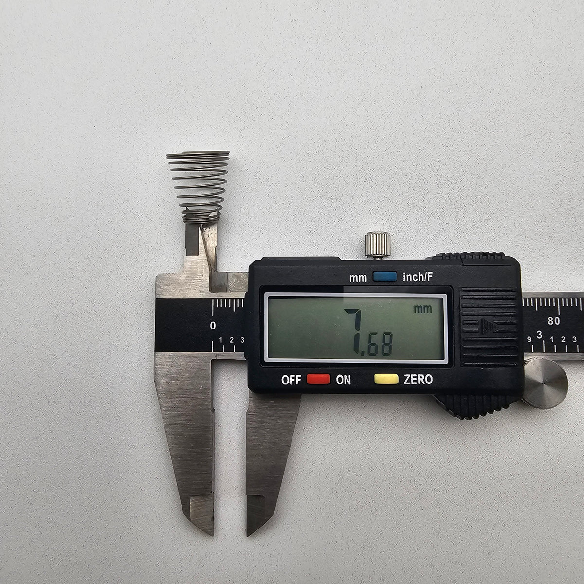 SWF_SUB ADJUSTTING TENSION SPRING